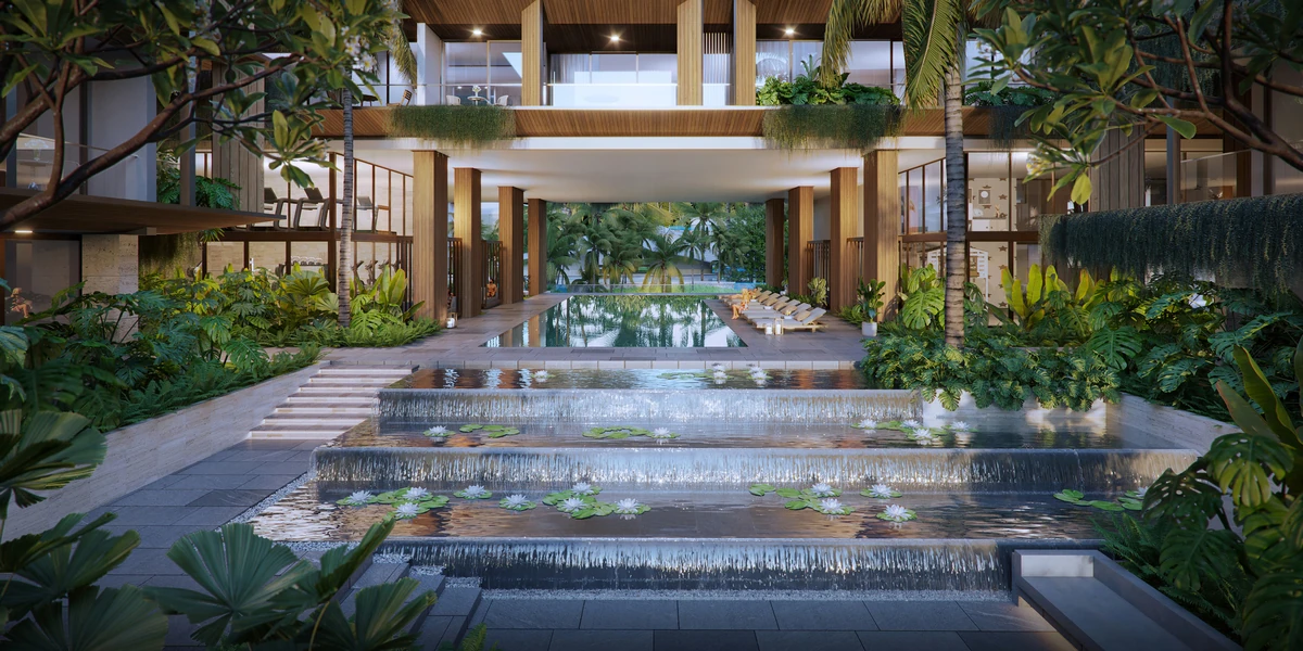 Swimming pool surrounded by tropical gardens at Eden Residences